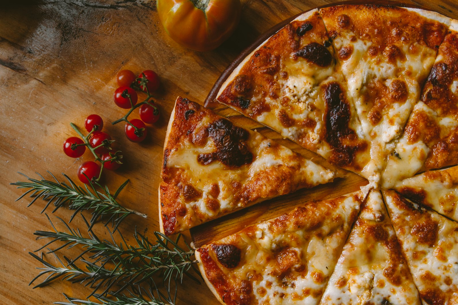 Friends sharing pizza outdoors
