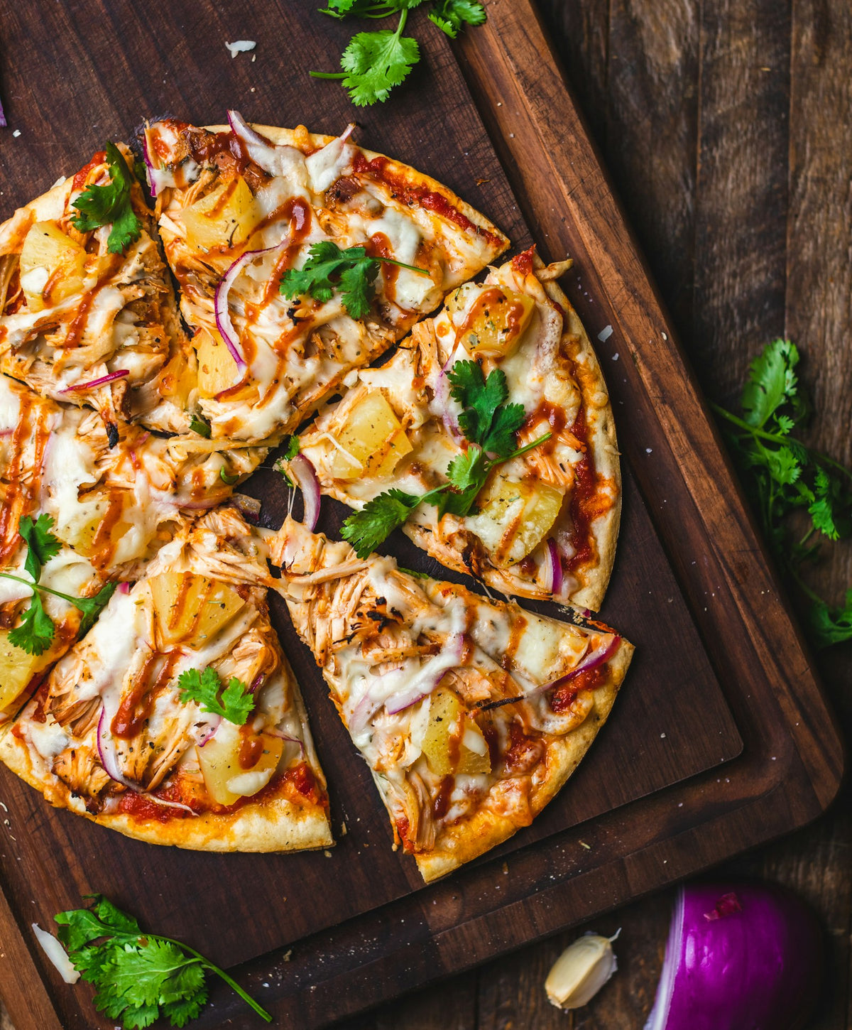 Prosciutto pizza with rocket leaves